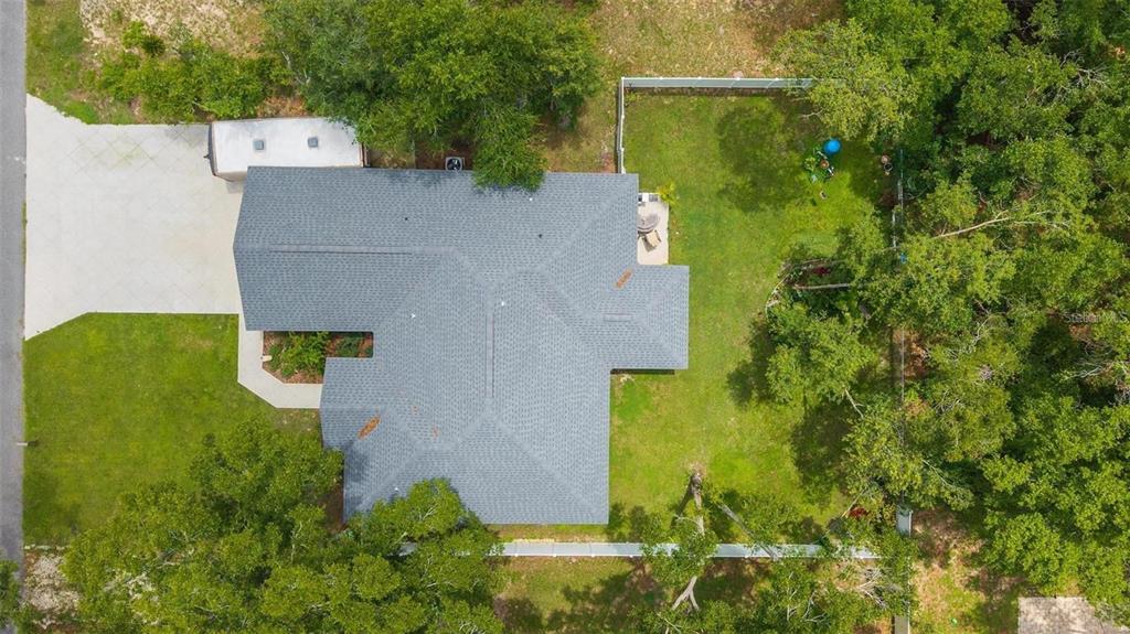 8160 Southeast 164th Place Summerfield, FL 34491 - Photo 52 of 56 an aerial view of a house with swimming pool