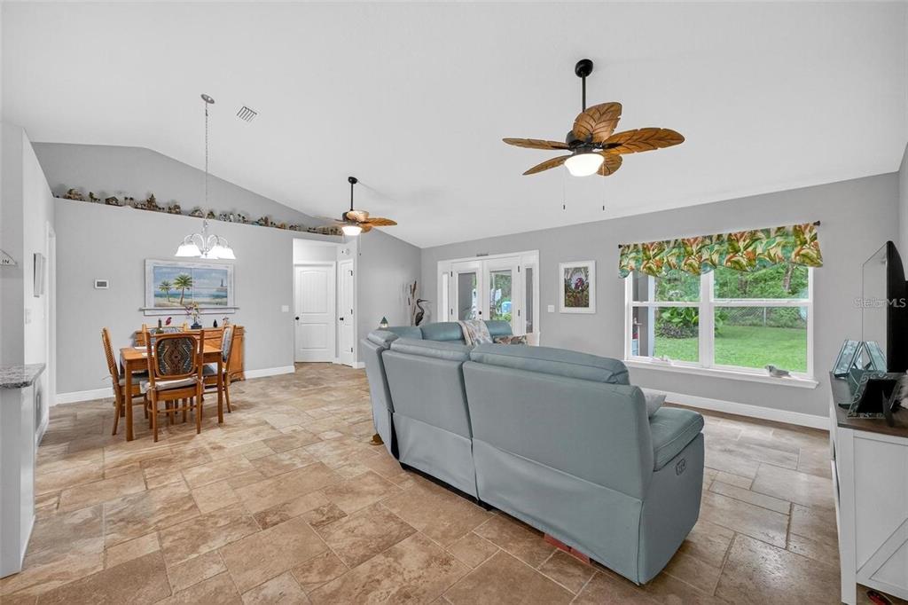 8160 Southeast 164th Place Summerfield, FL 34491 - Photo 6 of 56 a living room with furniture and a large window