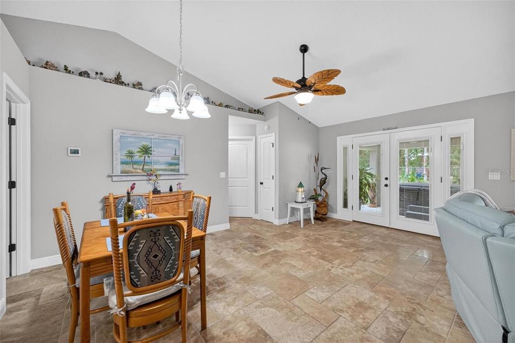 8160 Southeast 164th Place Summerfield, FL 34491 - Photo 8 of 56 a dining room with furniture and window