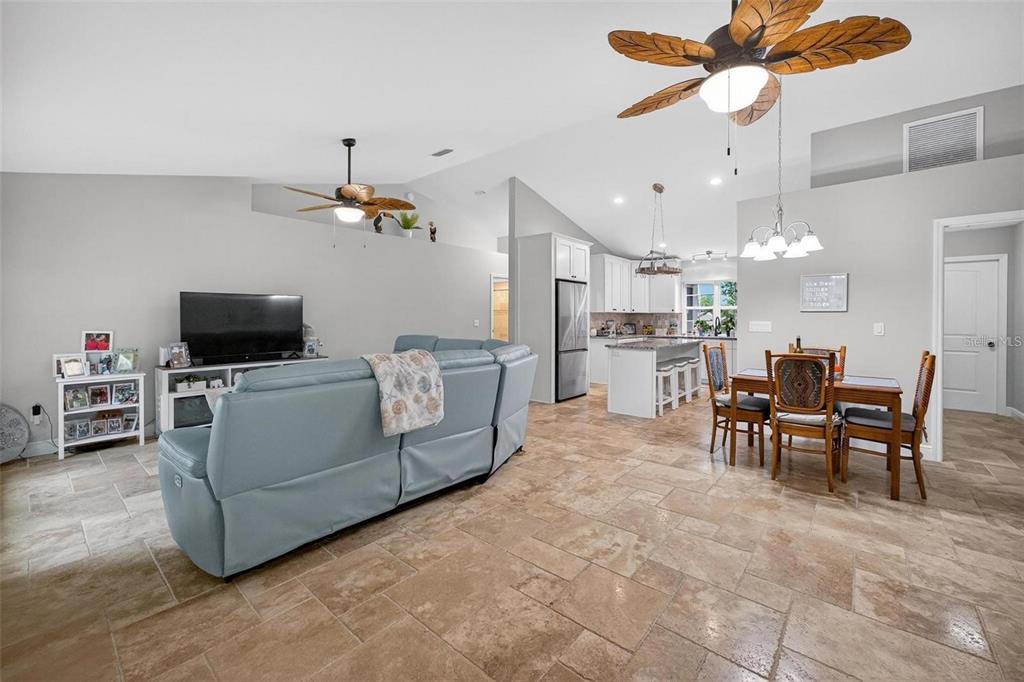 8160 Southeast 164th Place Summerfield, FL 34491 - Photo 10 of 56 a living room with furniture and a flat screen tv