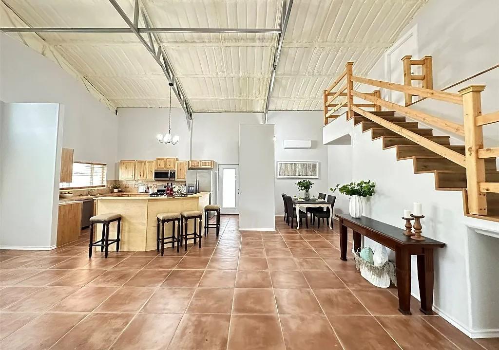2191 Bethany Road Sherman, TX 75090 - Photo 2 of 14 a living room with lots of furniture and kitchen view