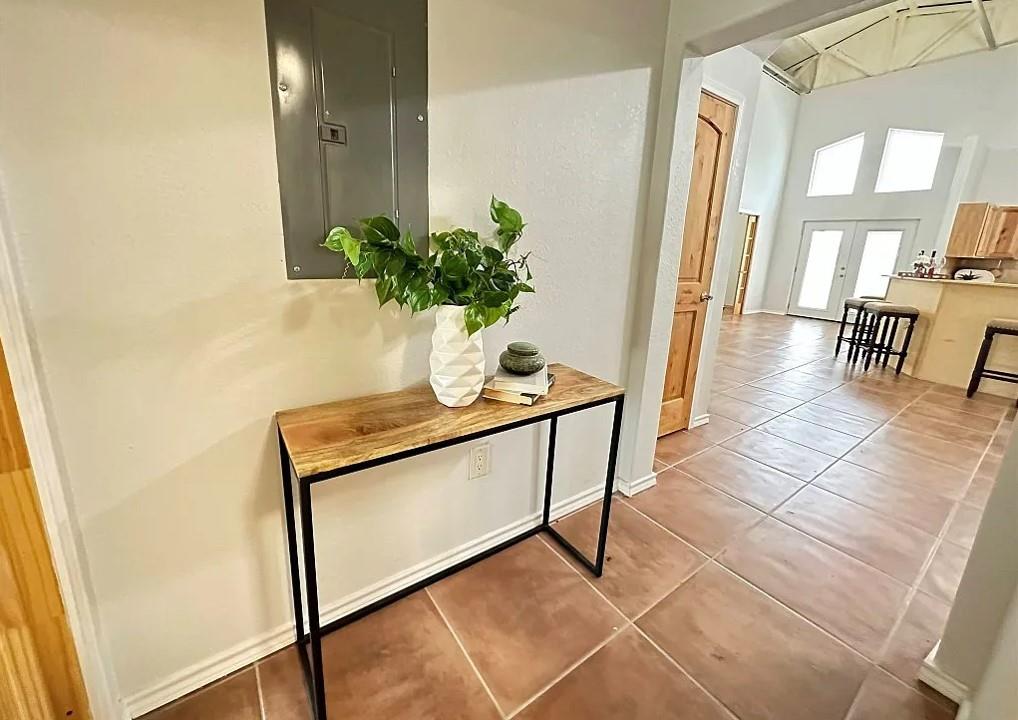 2191 Bethany Road Sherman, TX 75090 - Photo 7 of 14 a view of a room with a potted plant