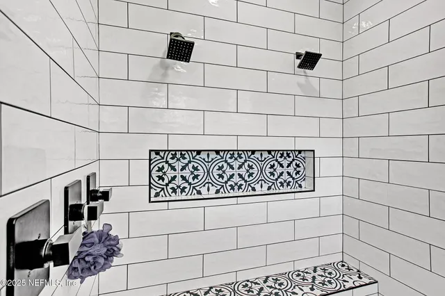 a close up of a street sign and shower