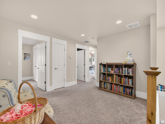 557 Craftsman Way Midway, UT 84049 - Photo 35 of 59 Carpeted hallway featuring recessed lighting and white trim detailing