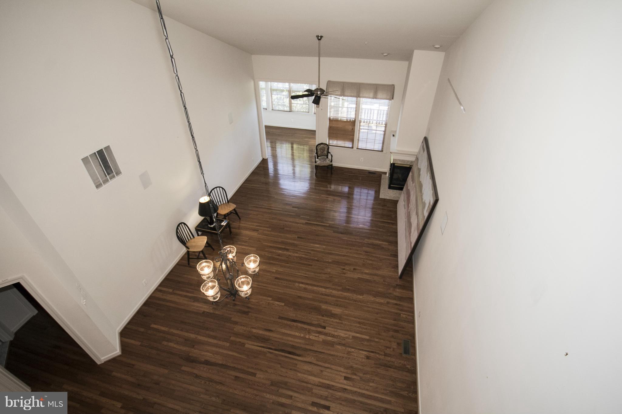 8429 Meadowsweet Road Baltimore, MD 21208 - Photo 11 of 30 View of Dining Room and Family Room from Loft