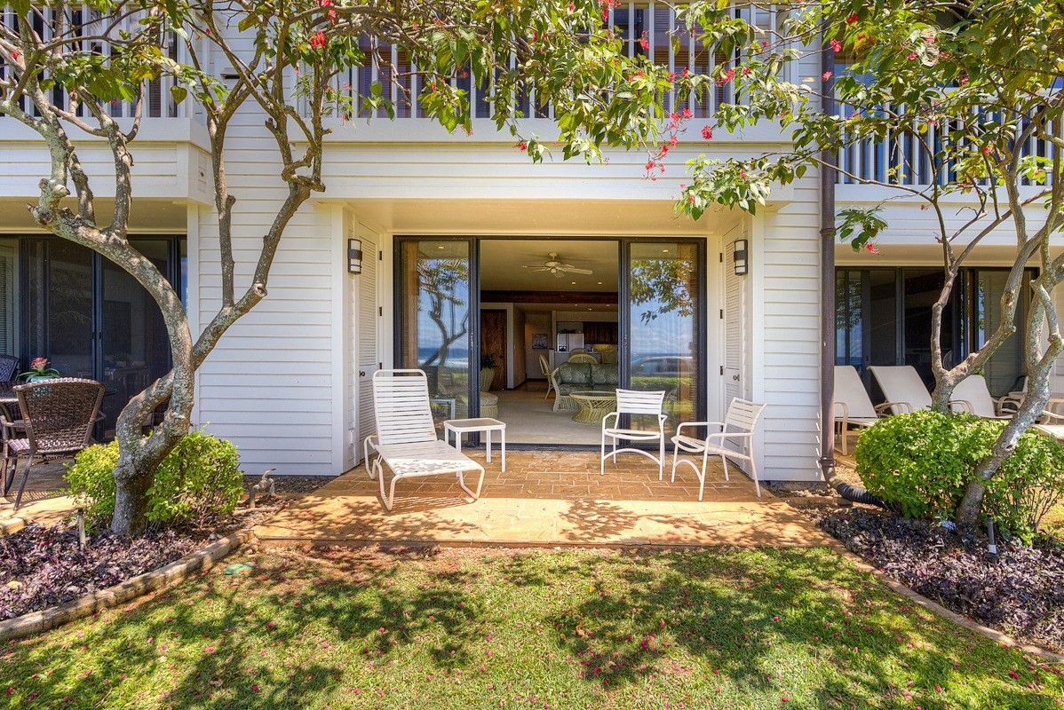 2221 Kapili Road, Unit 52 Koloa, HI 96756 - Photo 17 of 26 a view of a house with backyard porch and sitting area