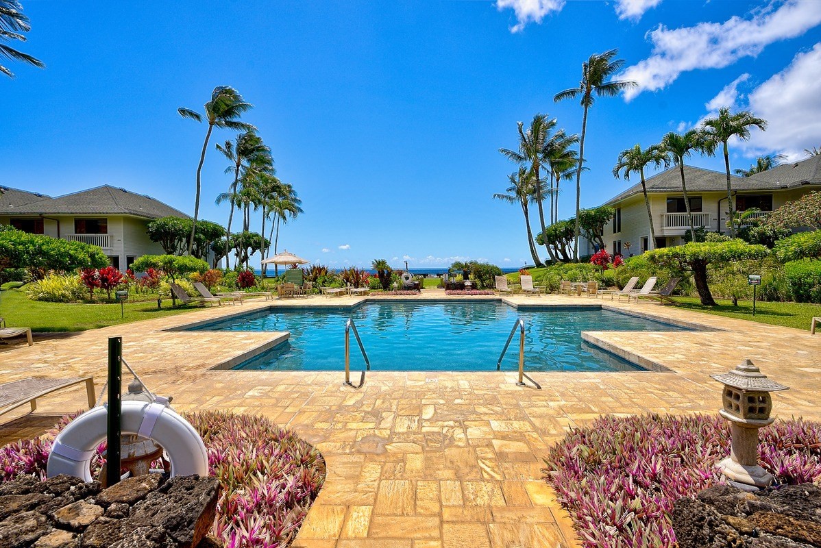 2221 Kapili Road, Unit 52 Koloa, HI 96756 - Photo 18 of 26 a view of an outdoor space and swimming pool