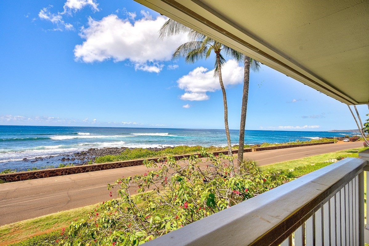 2221 Kapili Road, Unit 52 Koloa, HI 96756 - Photo 2 of 26 a view of an ocean and beach
