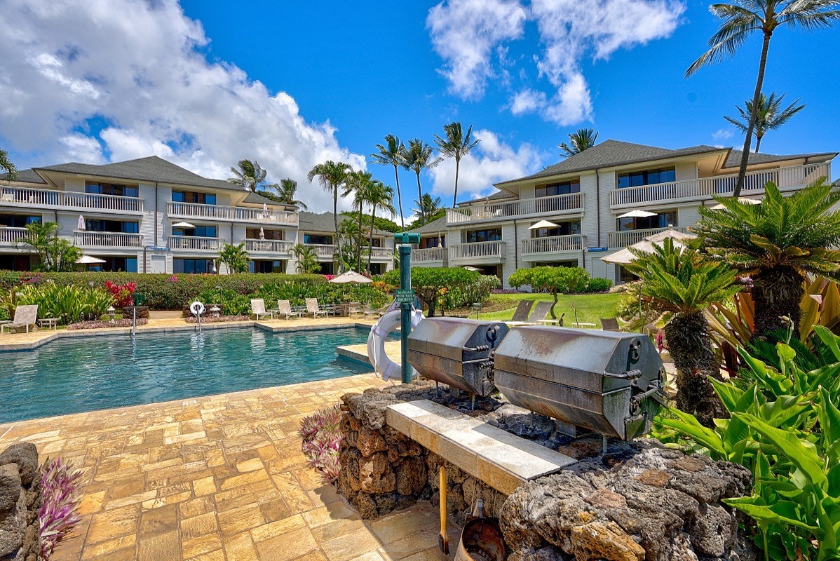 2221 Kapili Road, Unit 52 Koloa, HI 96756 - Photo 21 of 26 a view of a swimming pool with a patio