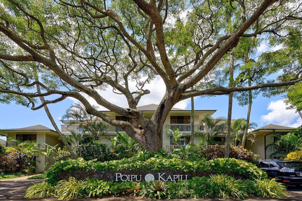 2221 Kapili Road, Unit 52 Koloa, HI 96756 - Photo 24 of 26 a view of a house with a tree