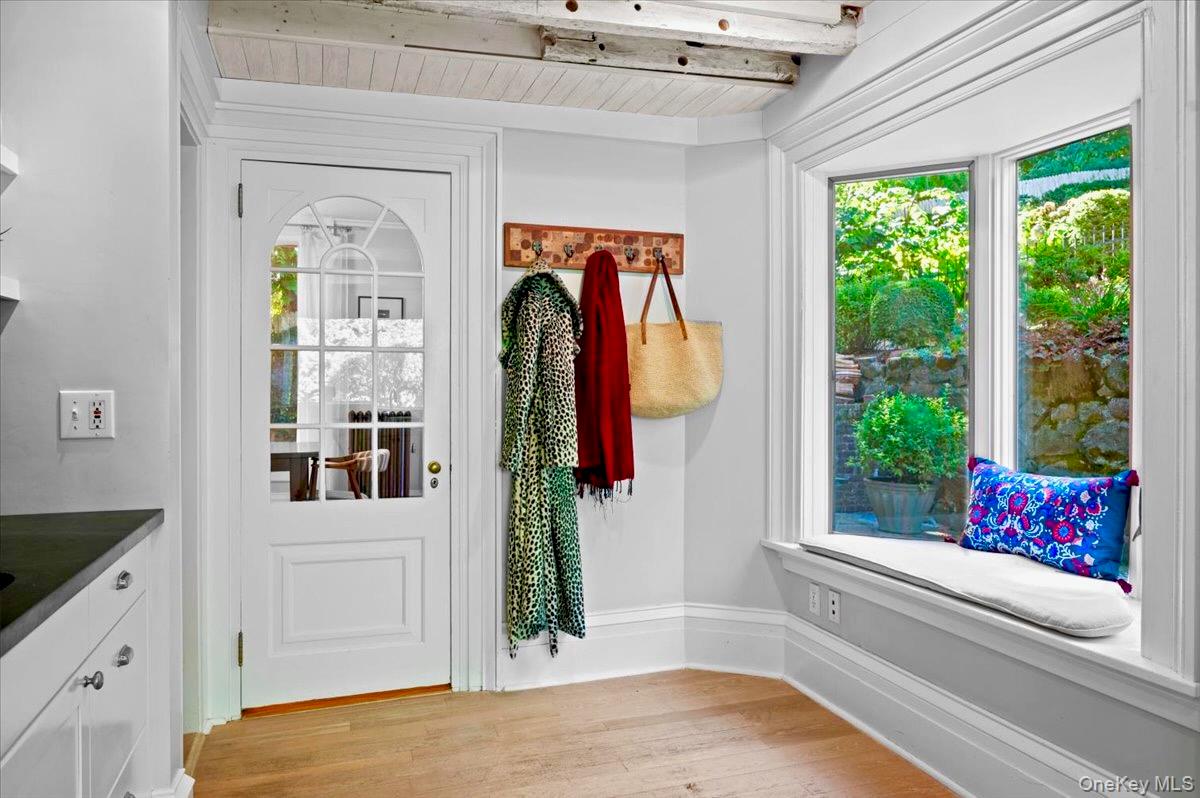 245 River Road Nyack, NY 10960 - Photo 22 of 45 Doorway to outside with wood finished floors and a wood ceiling with exposed beams