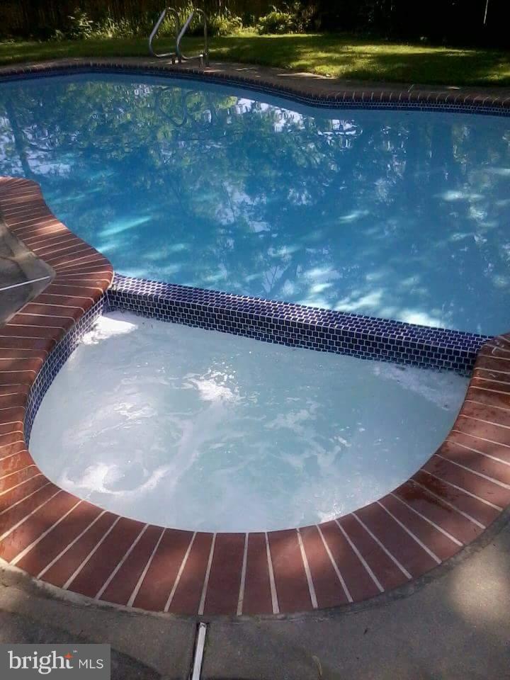 4727 Belle Forte Road Baltimore, MD 21208 - Photo 25 of 30 Enjoy Refreshing Pool and Hot Tub