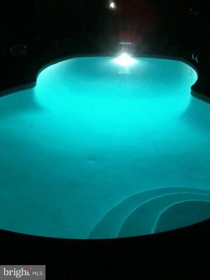 4727 Belle Forte Road Baltimore, MD 21208 - Photo 26 of 30 Lighted Pool and Lighted & Heated Hot Tub