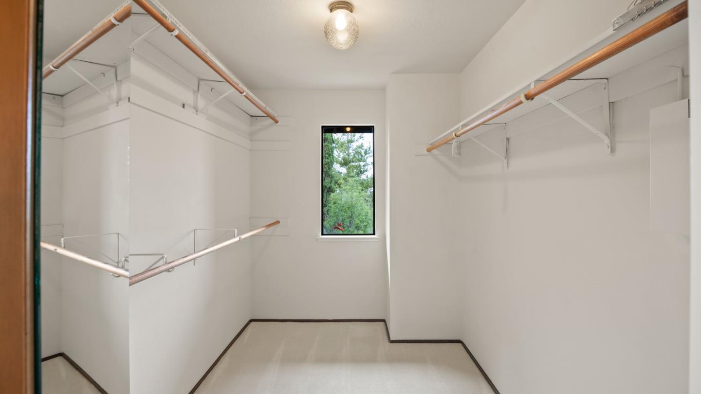 16353 Aztec Ridge Drive Los Gatos, CA 95030 - Photo 26 of 61 a view of a hallway with a white walls