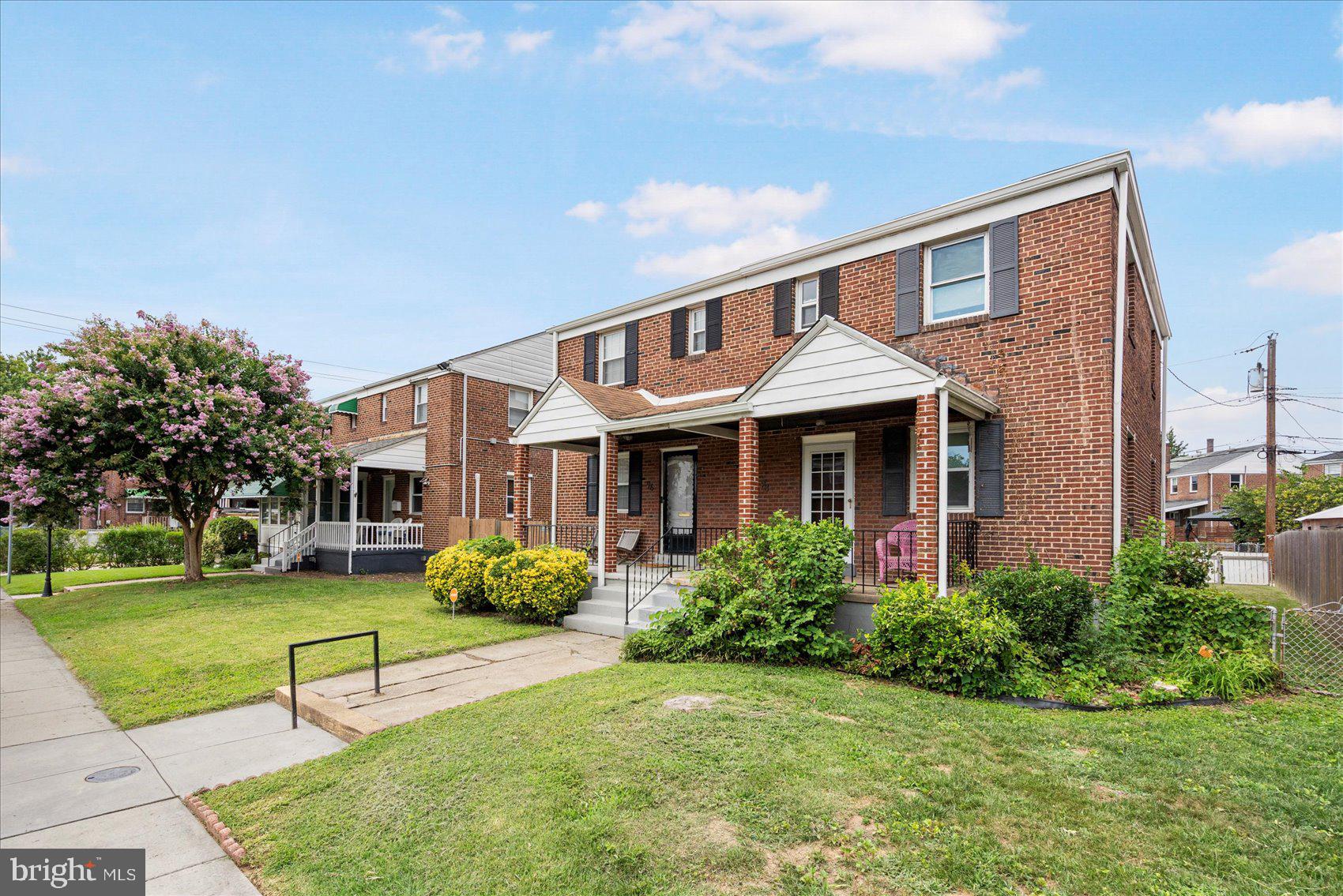 98 Kentway Baltimore, MD 21222 - Photo 2 of 35 a front view of a house with garden