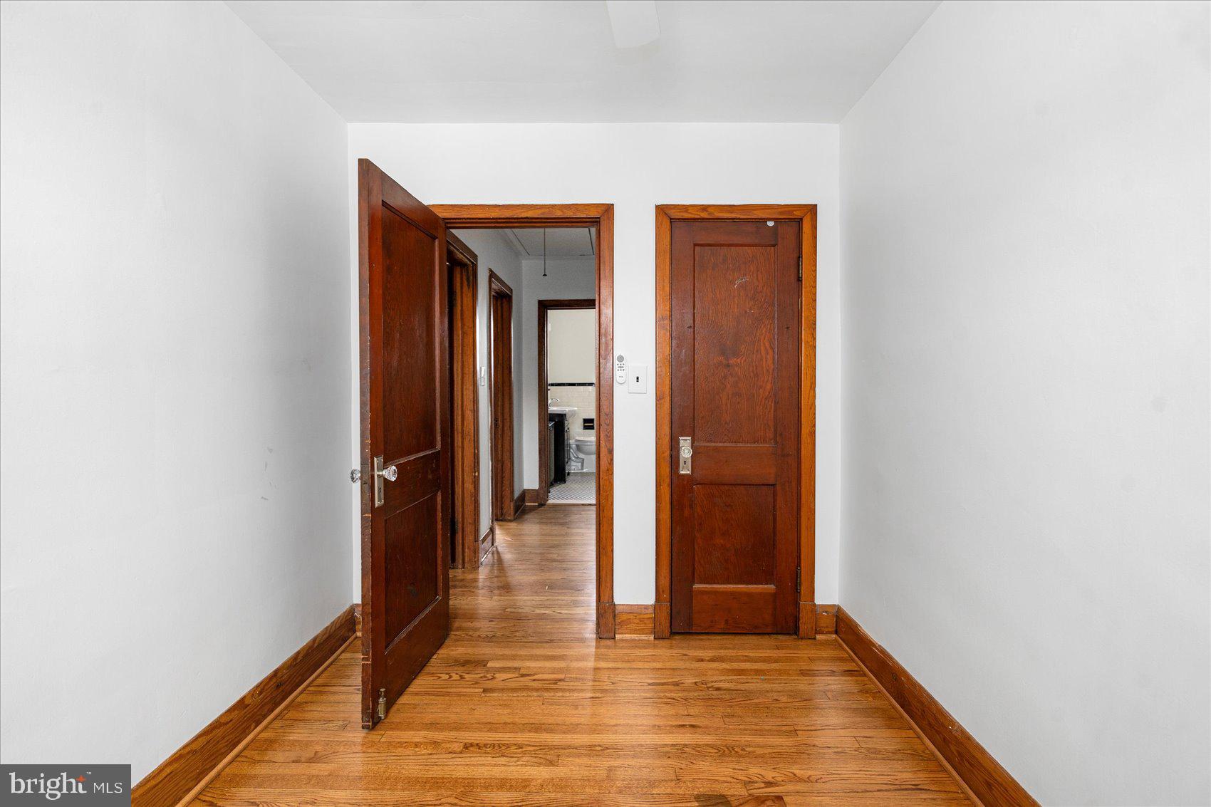 98 Kentway Baltimore, MD 21222 - Photo 22 of 35 a view of a hallway with wooden floor