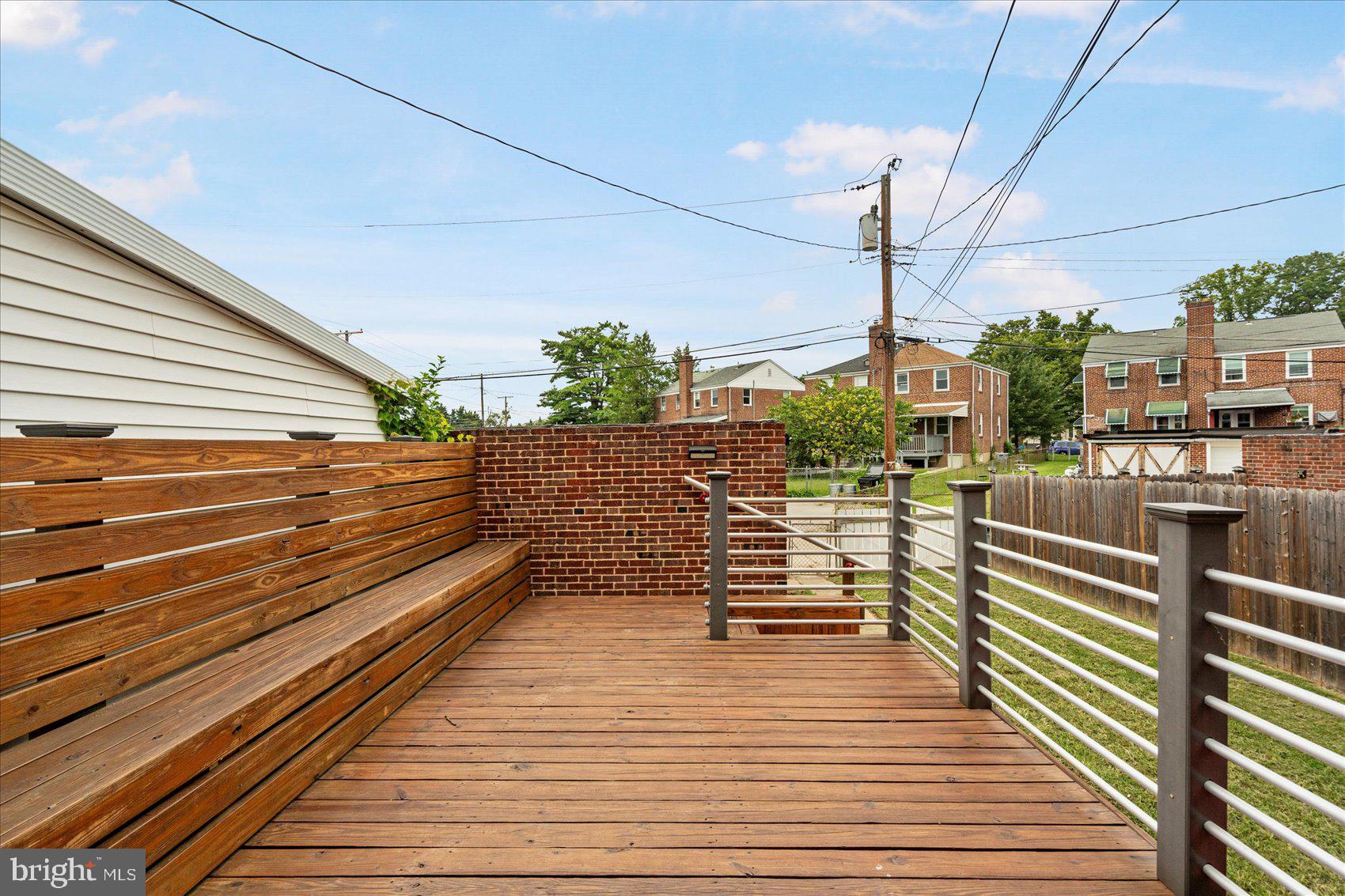 98 Kentway Baltimore, MD 21222 - Photo 31 of 35 a view of a balcony with wooden floor