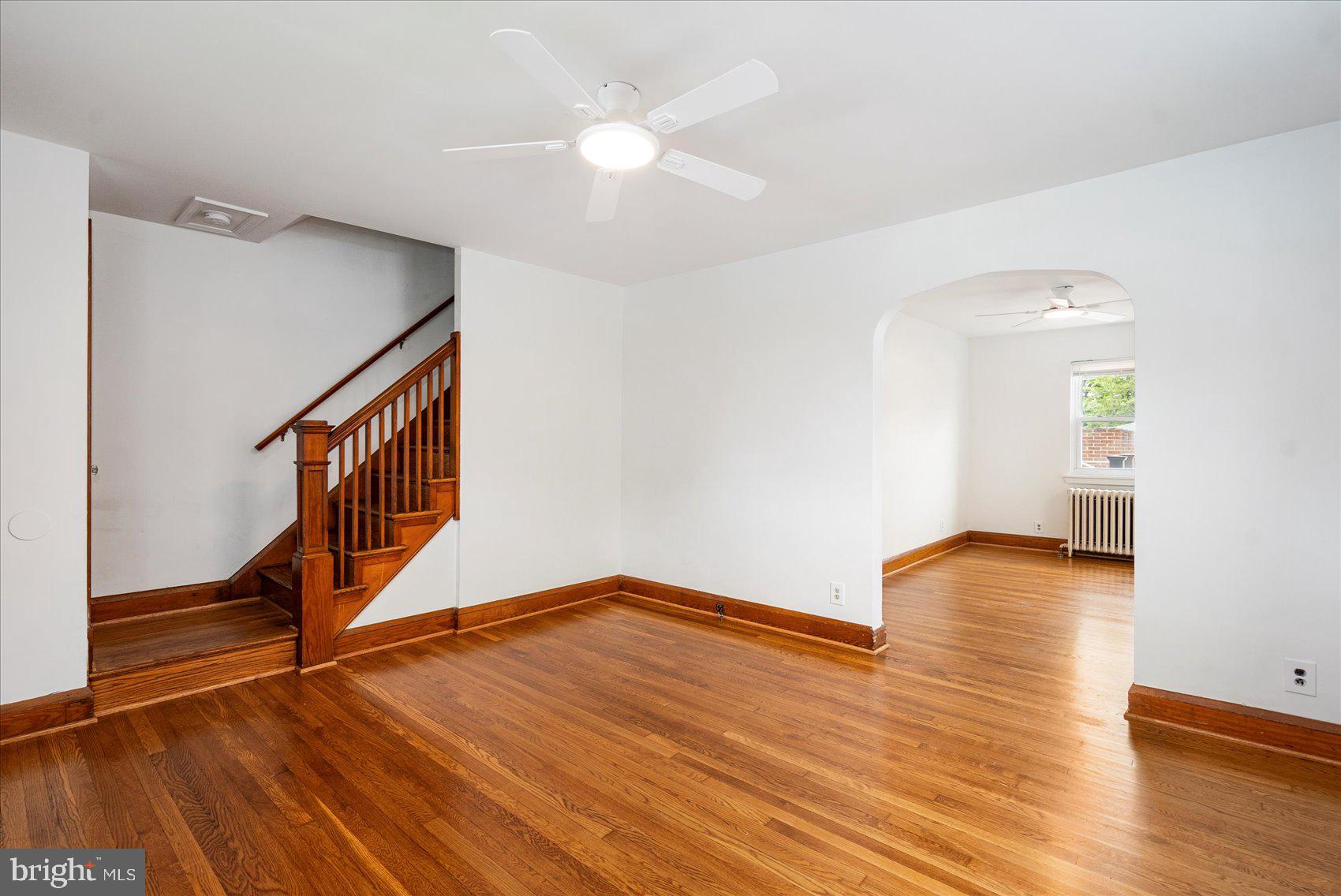 98 Kentway Baltimore, MD 21222 - Photo 4 of 35 a view of an empty room with wooden floor