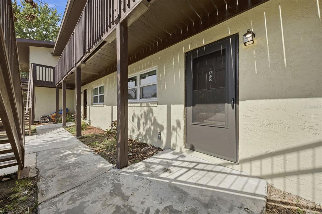 141 Fernery Road, Unit A3 Lakeland, FL 33809 - Photo 3 of 40 a view of a porch