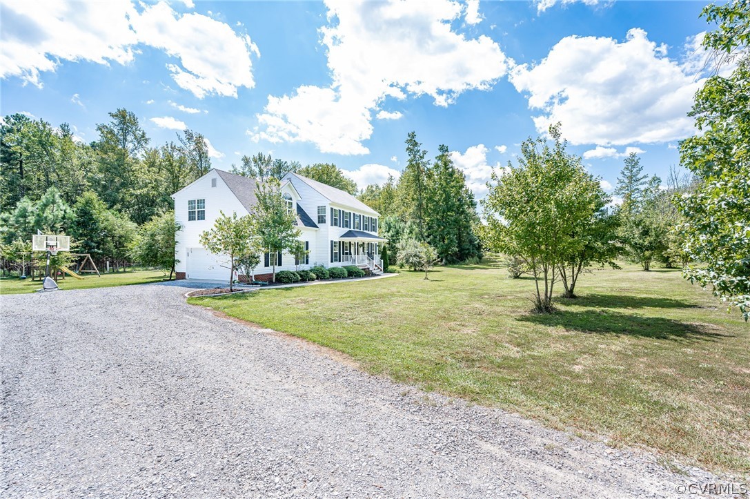 13063 Noel Road Beaverdam, VA 23047 - Photo 4 of 39 a view of outdoor space with trees all around
