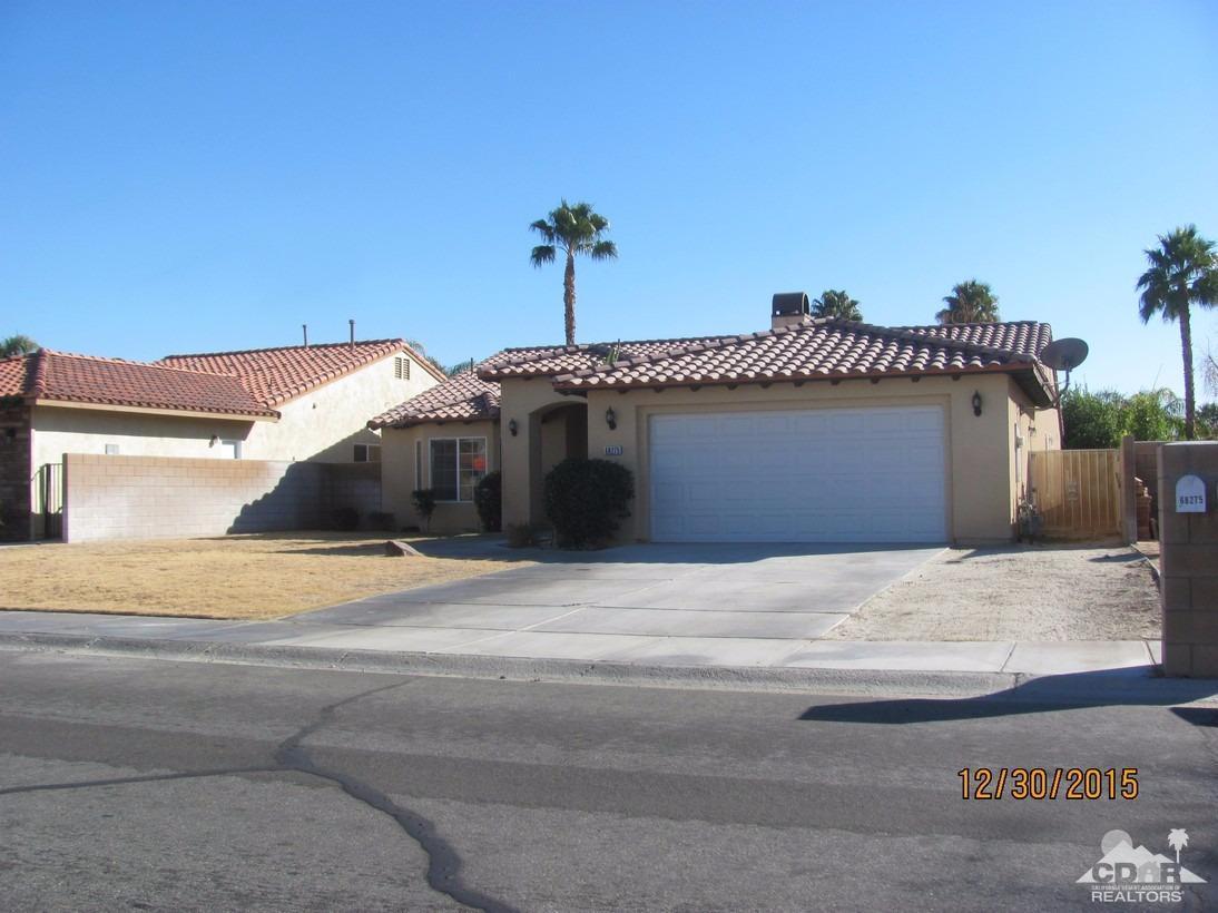68275 Tortuga Road Cathedral City, CA 92234 - Photo 2 of 18 a front view of a house with a yard