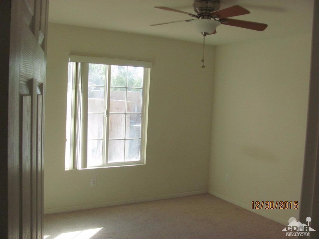 68275 Tortuga Road Cathedral City, CA 92234 - Photo 9 of 18 an empty room with a window
