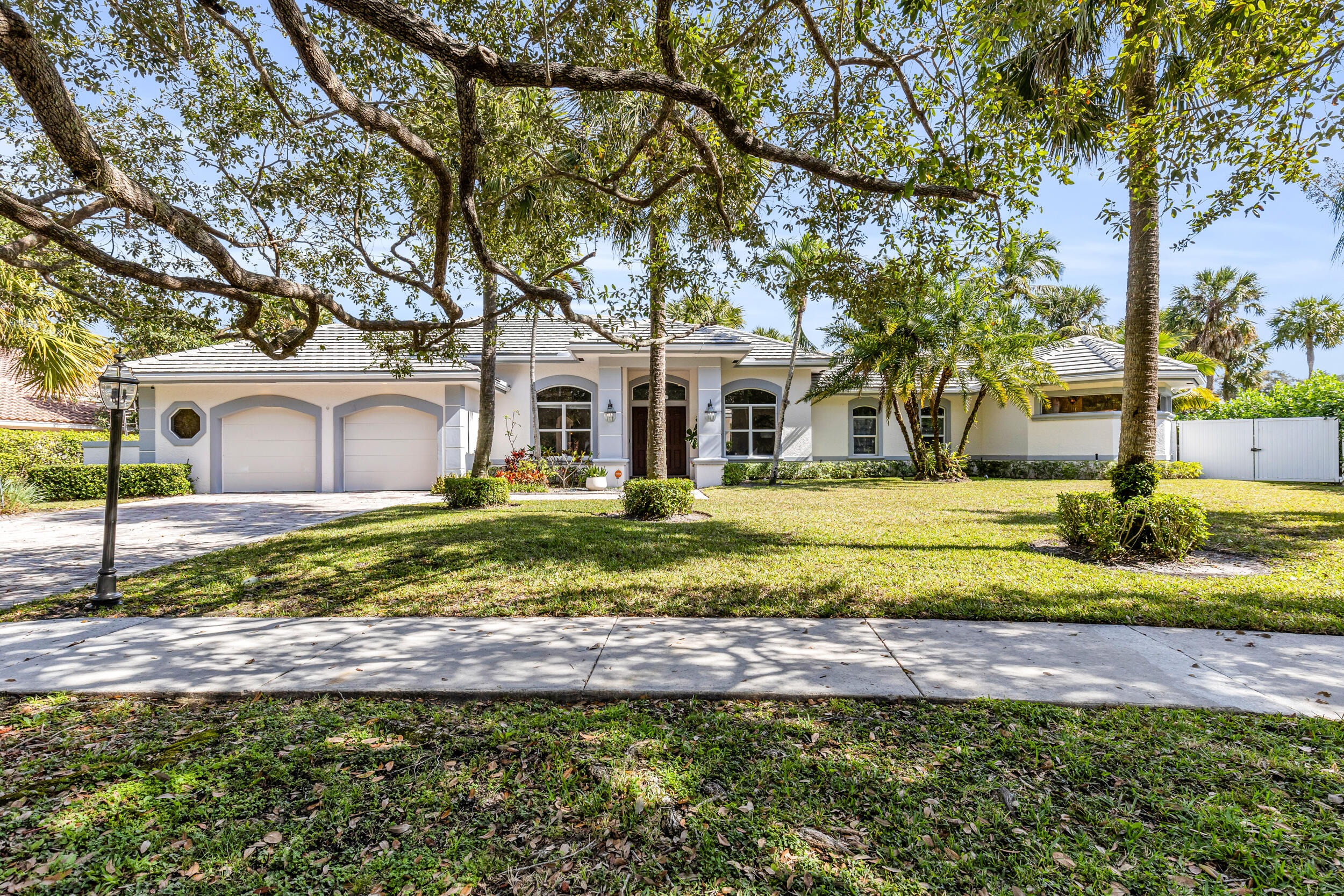 2375 Rabbit Hollowe Circle Delray Beach, FL 33445 - Photo 3 of 62 Custom Courtyard Style Home on 1/2 Acre