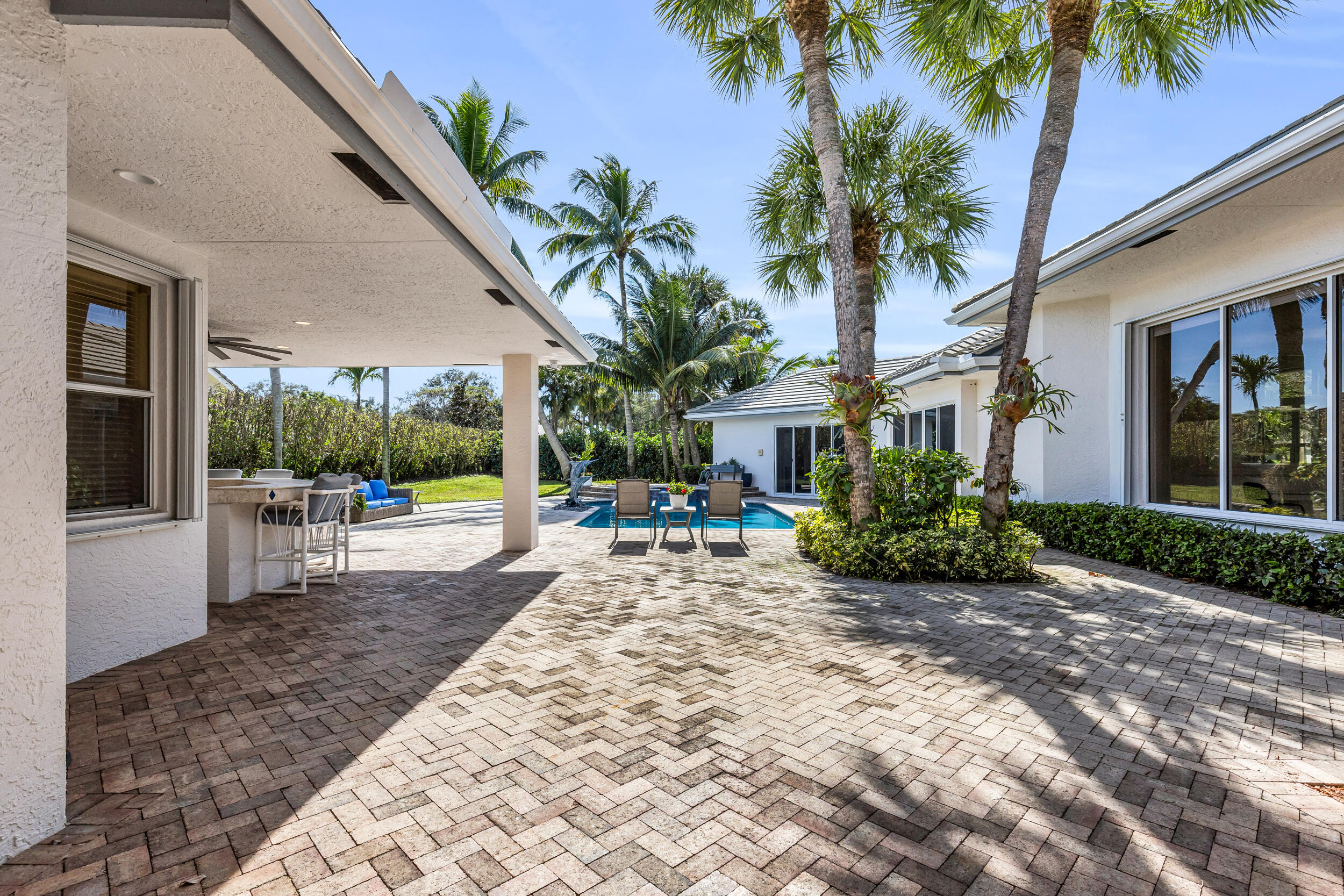 2375 Rabbit Hollowe Circle Delray Beach, FL 33445 - Photo 47 of 62 Outdoor Paradise with Pool, Bar & Grill