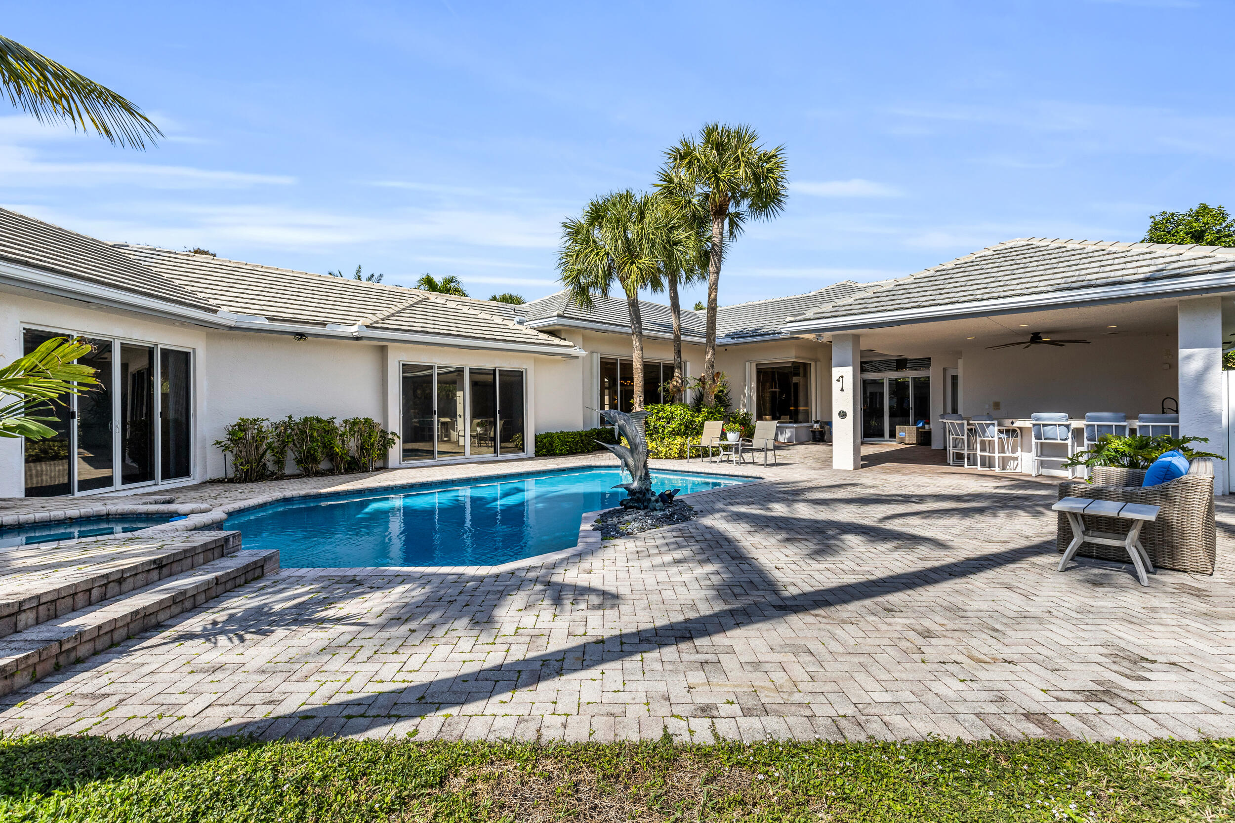 2375 Rabbit Hollowe Circle Delray Beach, FL 33445 - Photo 51 of 62 Outdoor Paradise with Pool, Bar & Grill