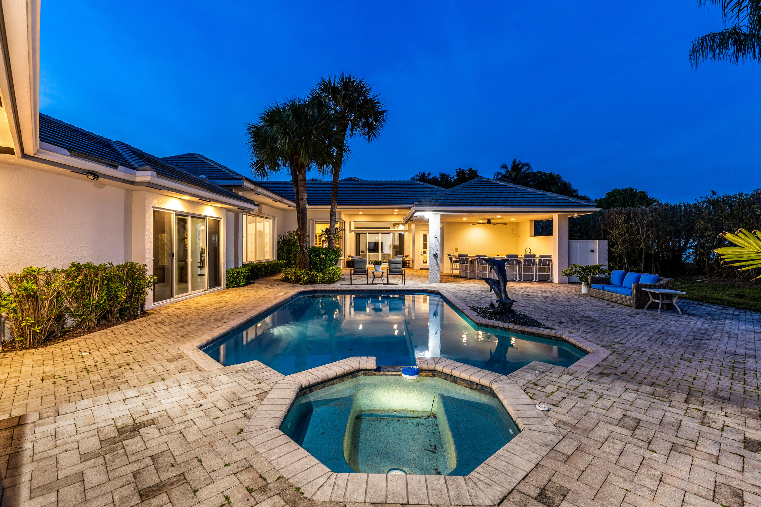 2375 Rabbit Hollowe Circle Delray Beach, FL 33445 - Photo 56 of 62 The Backyard Comes Alive At Night!