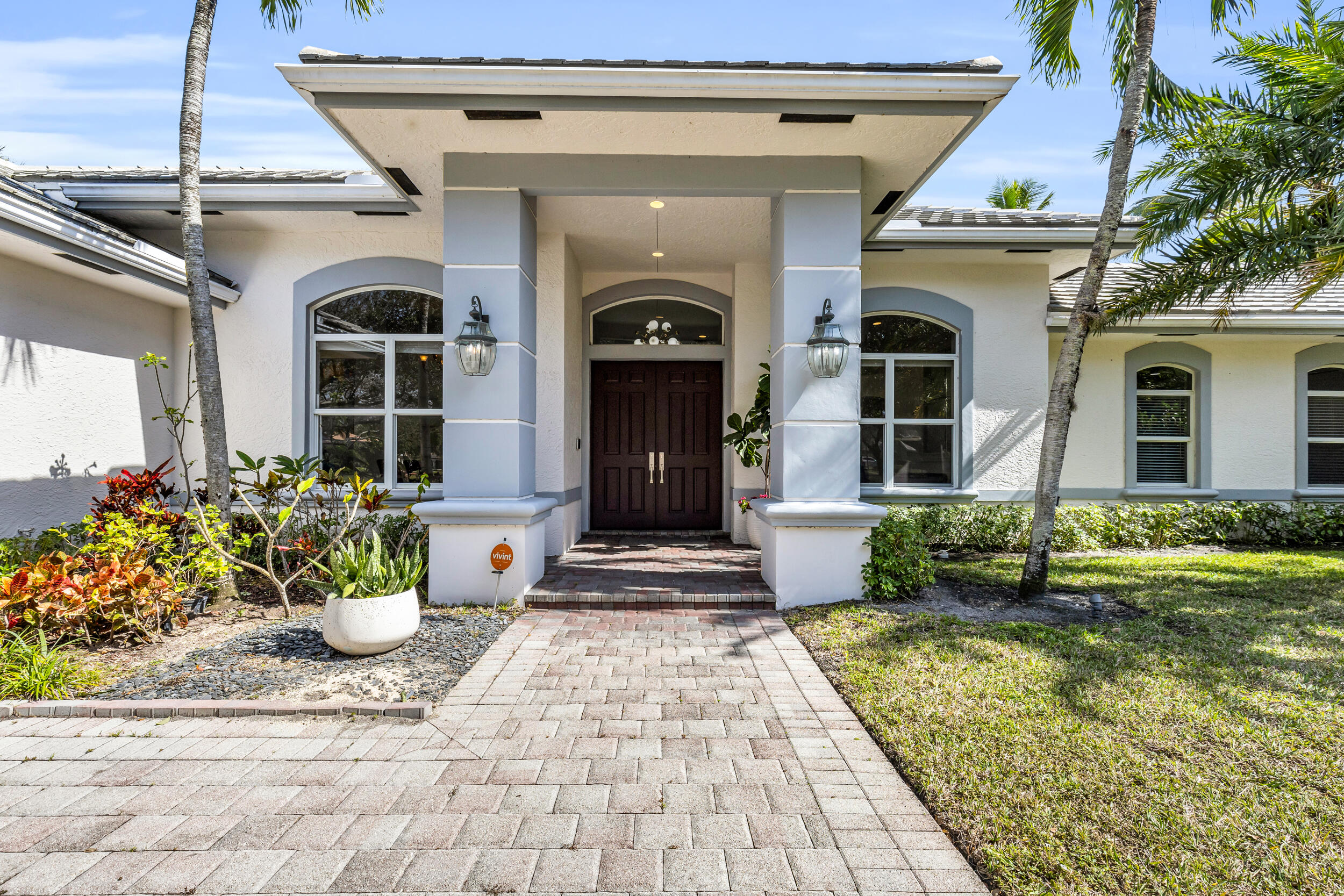 2375 Rabbit Hollowe Circle Delray Beach, FL 33445 - Photo 9 of 62 Exterior Front of Home