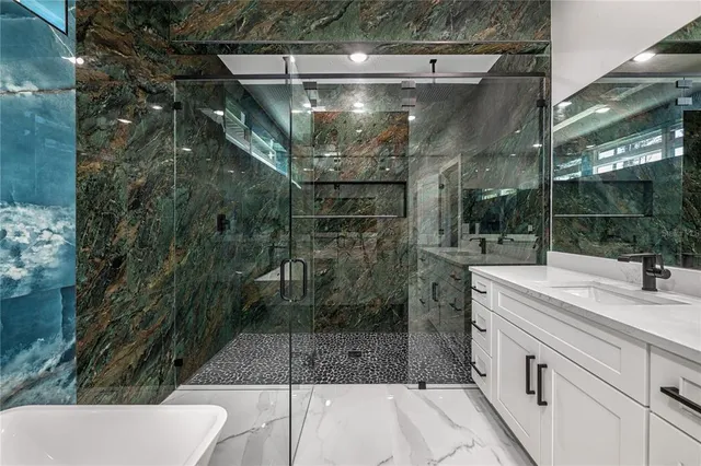 an aerial view of residential houses with outdoor space