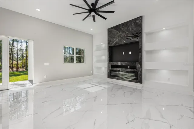 a view of a room with a large window