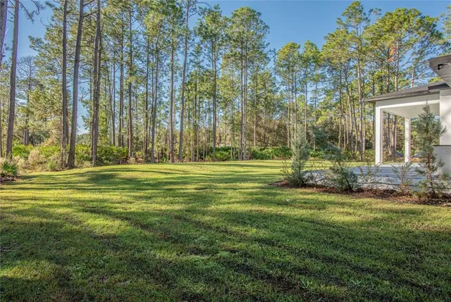 a view of swimming pool with outdoor seating