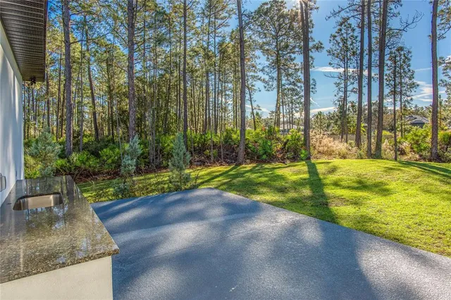 a view of a park with welcome board