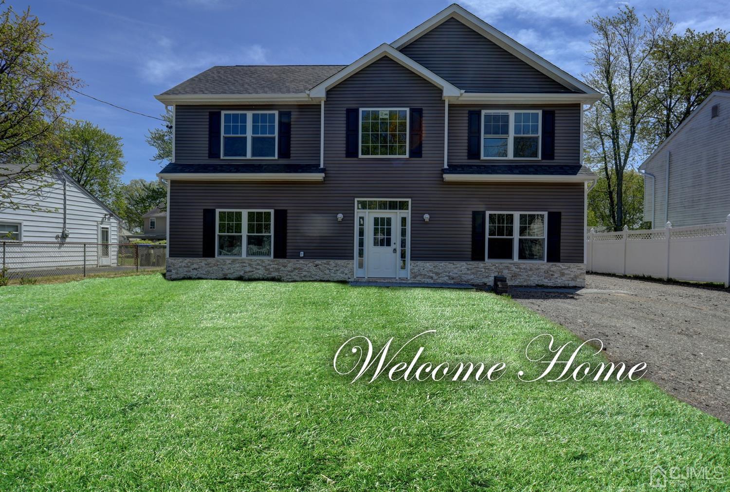 16 Idlewild Road Edison, NJ 08817 - Photo 1 of 15 a view of a house with a yard