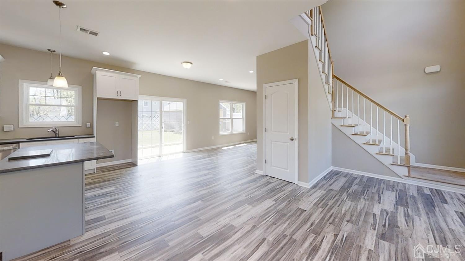 16 Idlewild Road Edison, NJ 08817 - Photo 3 of 15 a view of an entryway wooden floor and a window