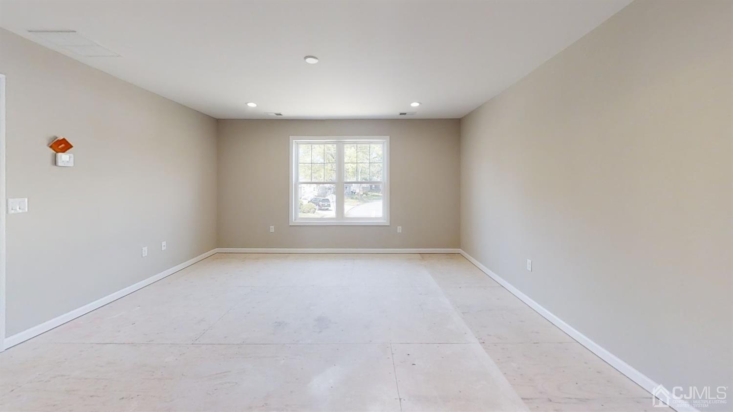 16 Idlewild Road Edison, NJ 08817 - Photo 9 of 15 an empty room with a window