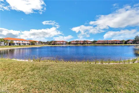 a view of a lake with a city