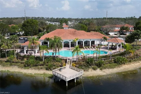 a view of a lake with house and outdoor space