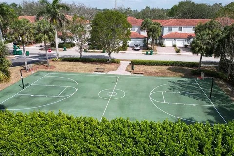 an aerial view of a house with outdoor space