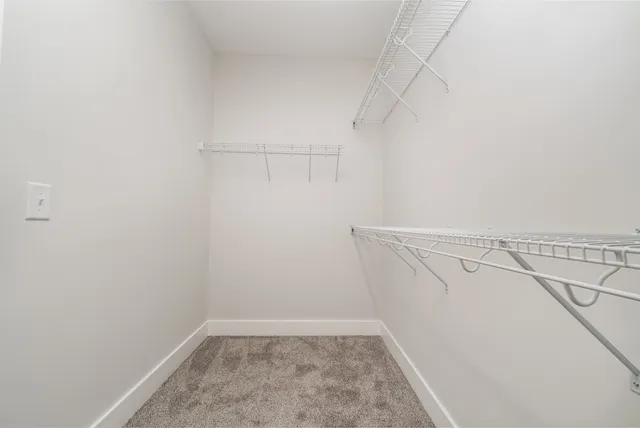 a view of a room with racks on the wall