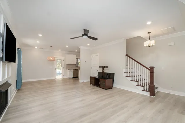 a view of a livingroom with a staircase