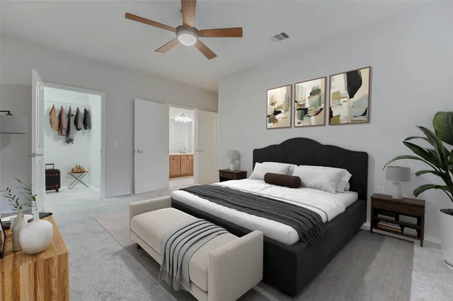 a bedroom with a bed and a couch