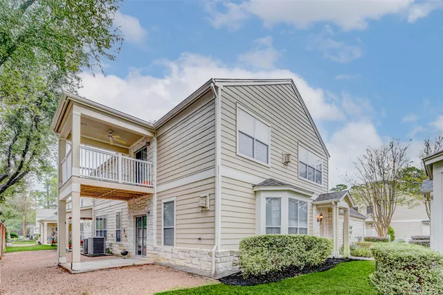 a front view of a building with garden