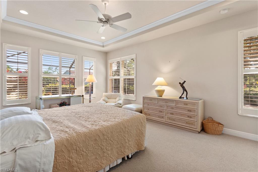 8855 Largo Mar Drive Estero, FL 33967 - Photo 20 of 50 a bedroom with a bed and a window