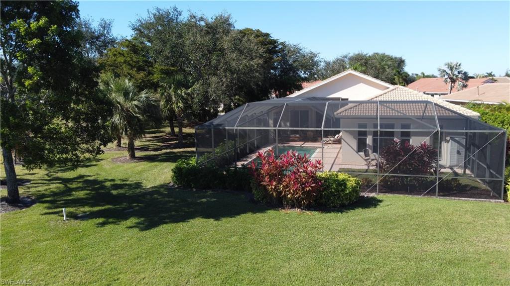 8855 Largo Mar Drive Estero, FL 33967 - Photo 37 of 50 a view of a backyard