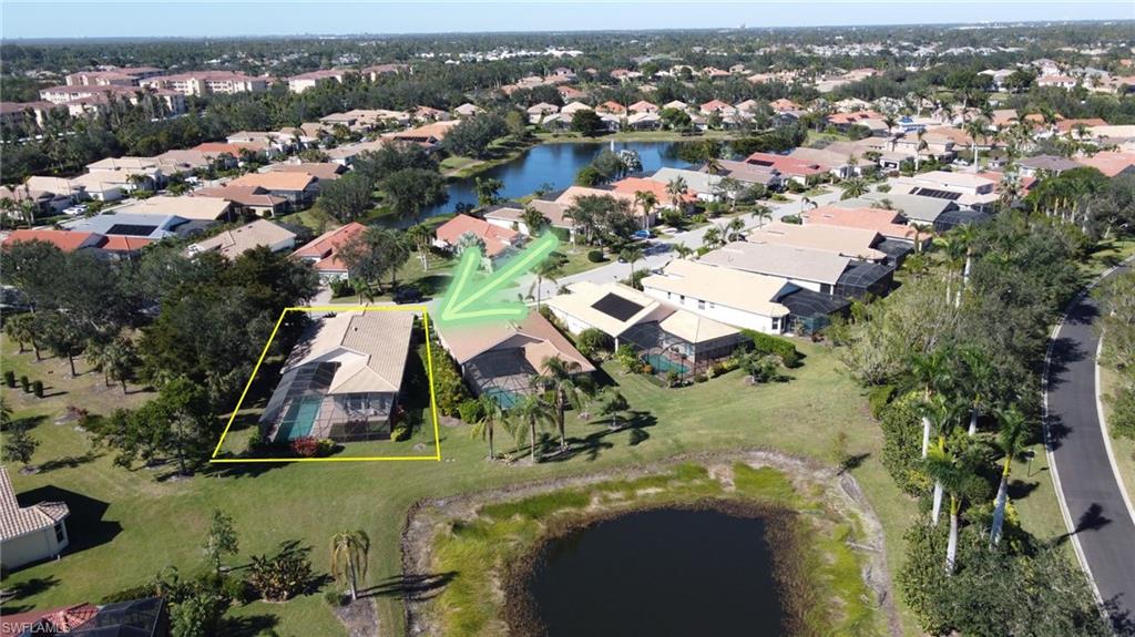 8855 Largo Mar Drive Estero, FL 33967 - Photo 40 of 50 an aerial view of residential houses with outdoor space