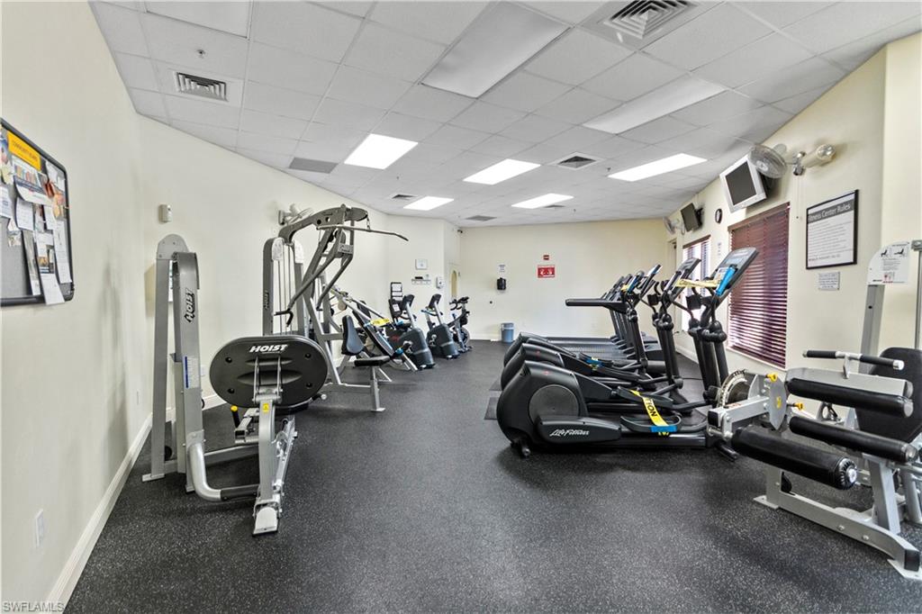 8855 Largo Mar Drive Estero, FL 33967 - Photo 42 of 50 a view of a room with gym equipment