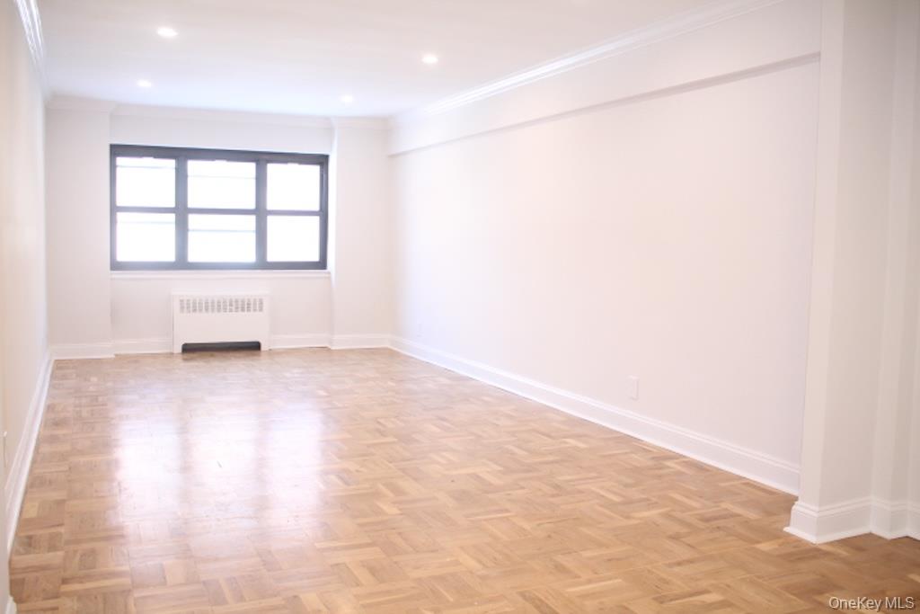 50 White Oak Street, Unit 1C New Rochelle, NY 10801 - Photo 11 of 24 an empty room with windows